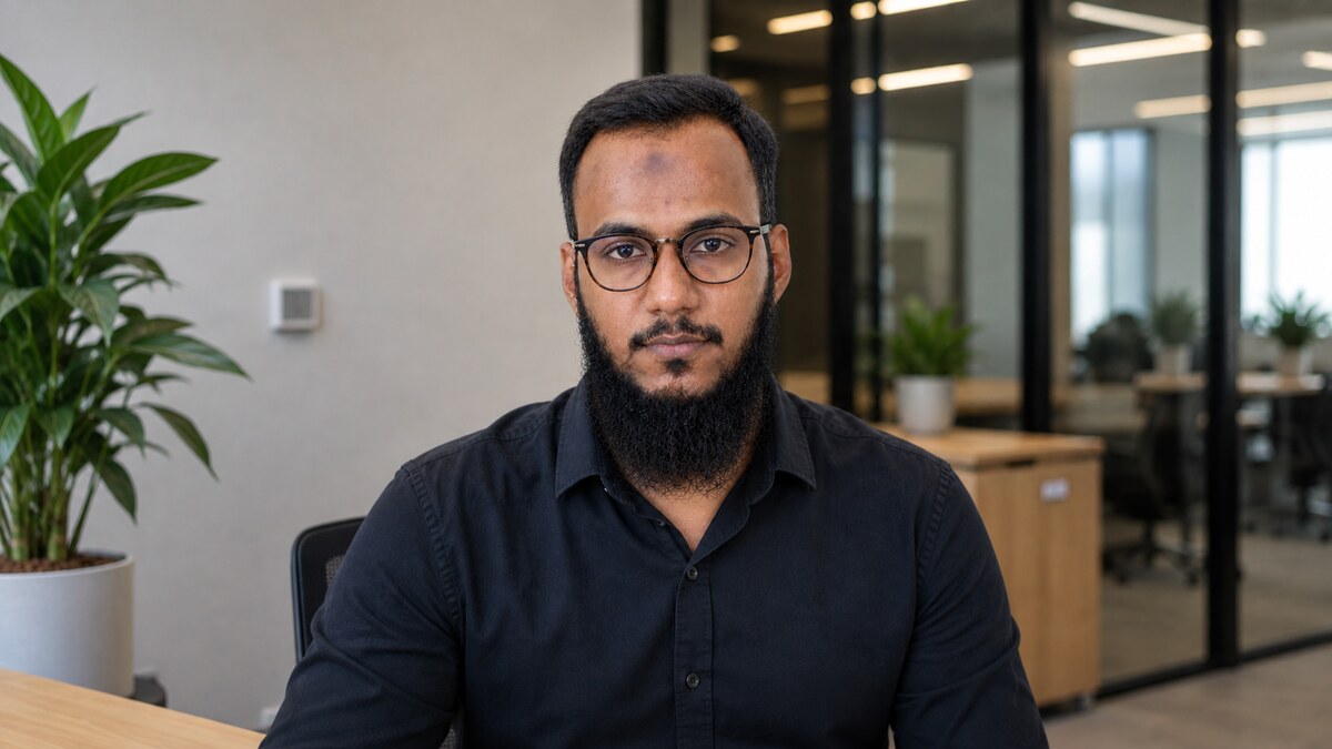 Muhammad Mustafa, full-stack SaaS and AI developer for UAE businesses, in a modern technology office